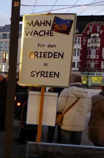 Grossaufnahme vom Schild: Mahnwache für den Frieden in Syrien